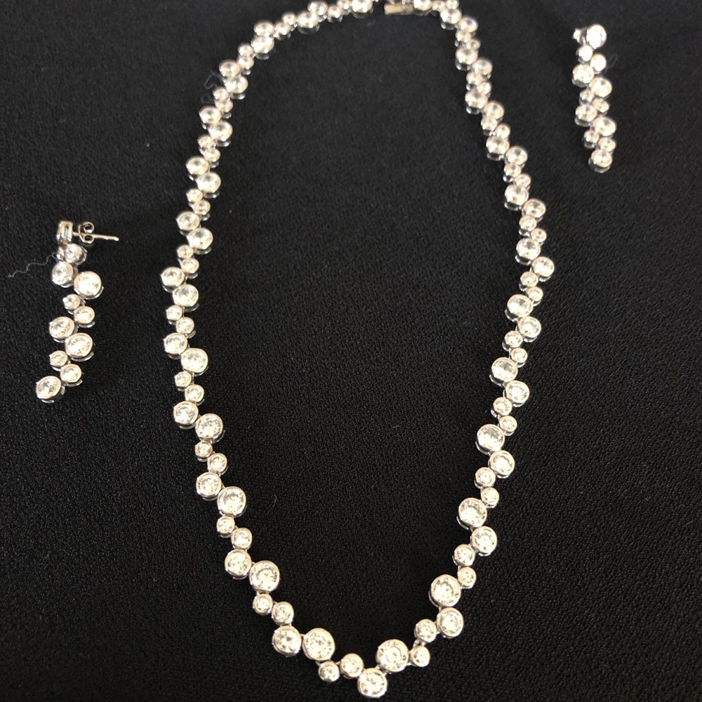 Silver necklace and matching earring set